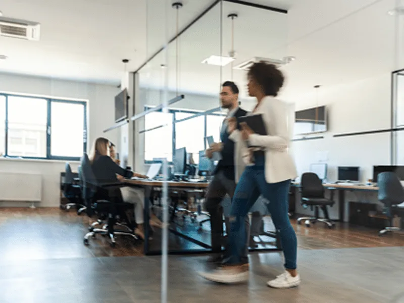 People working in a contemporary commercial office